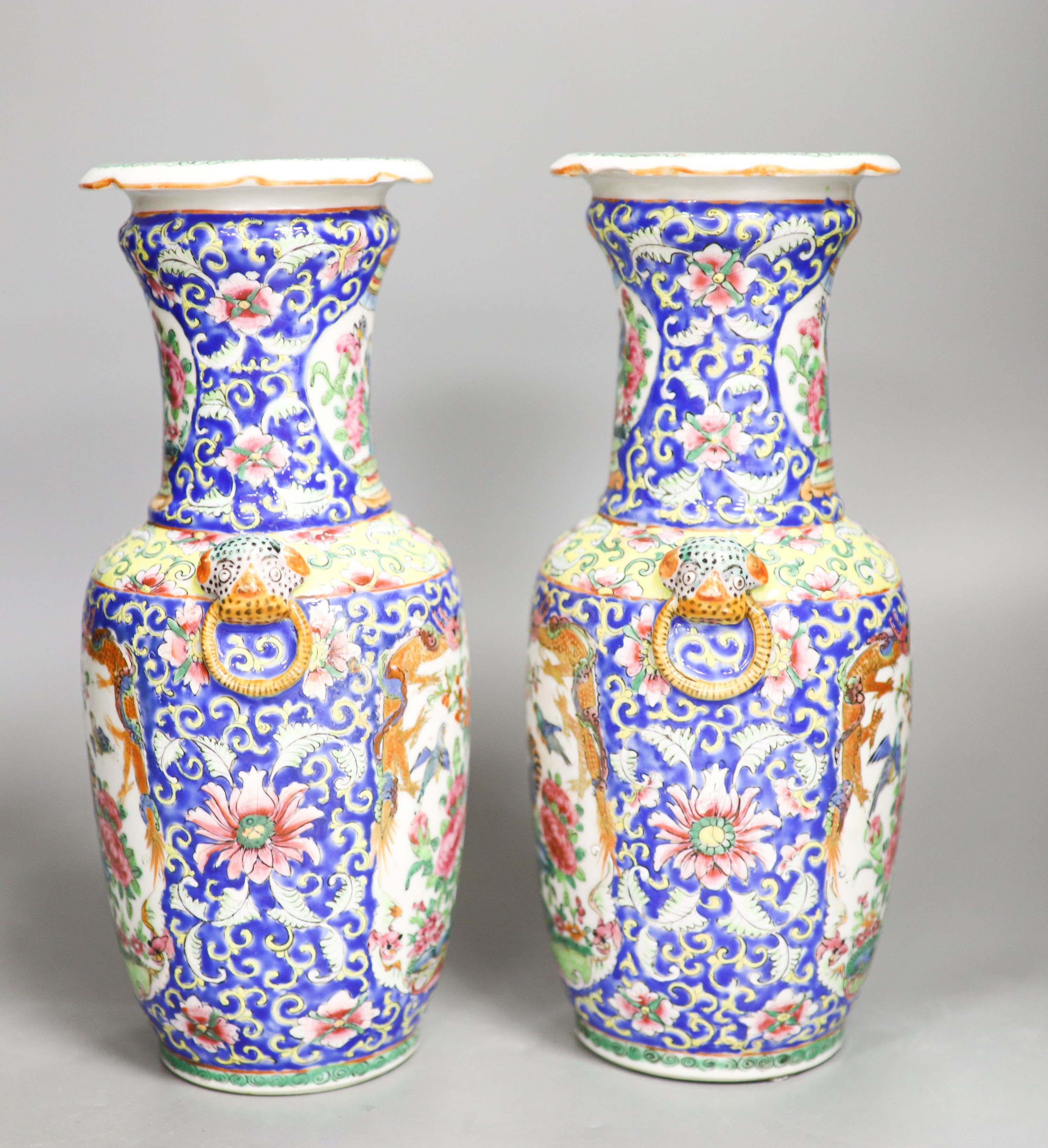 A pair of 19th century Chinese famille rose vases 24.5cm